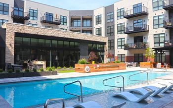 Resort-style pool with sundeck 